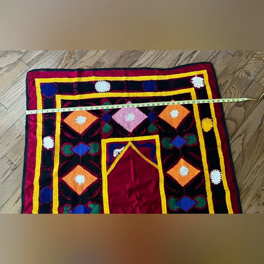 Suzane embroidered with cotton threads on cotton red fabric, hand made
